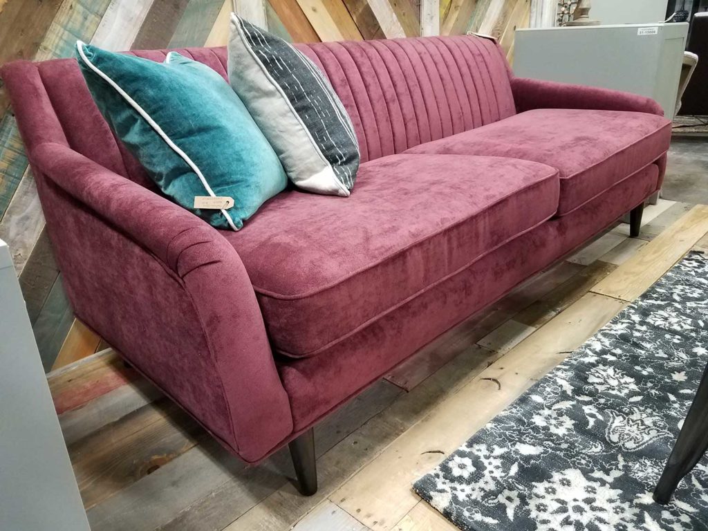 plum colored leather sofa
